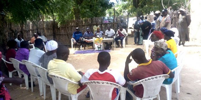 IMG_20191112_105810_5 Mrs Yelwa sitting in the Middle of two men as one of the Executive of VSLA Pro-Act project in Dumne Community of Adamawa State